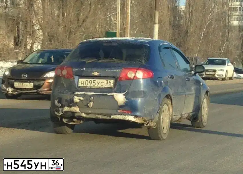 Фото автомобиля MAZDA 3, 2012 — госномер Н545УН36. Цвет: Коричневый