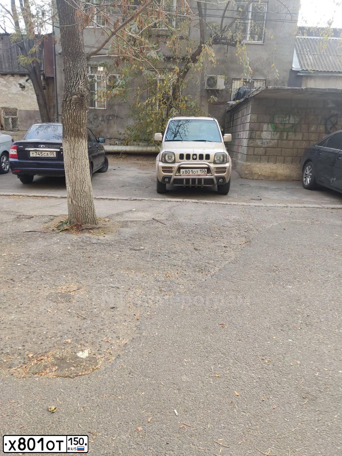Фото автомобиля SUZUKI JIMNY, 2007 — госномер Х801ОТ05. Цвет: БЕЖЕВЫЙ