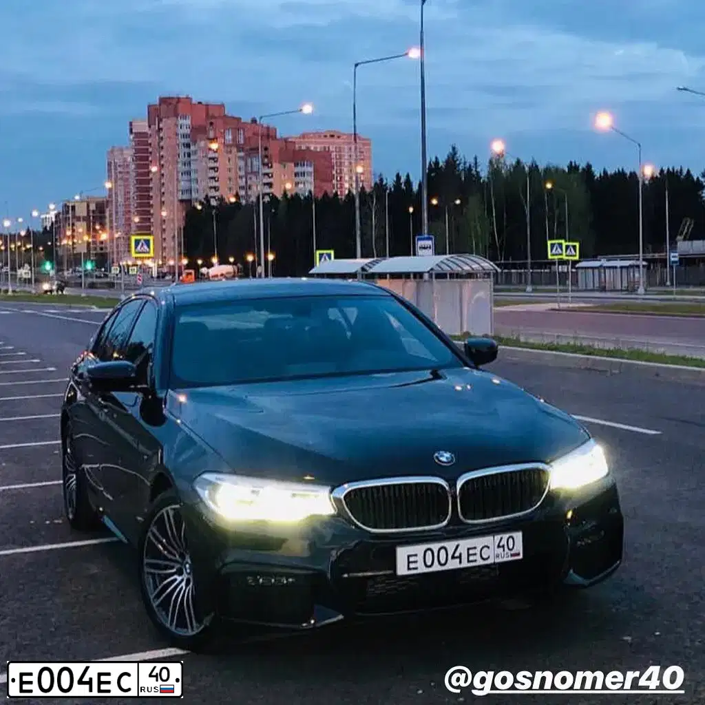 Фото автомобиля ВАЗ 21043, 1991 — госномер Е004ЕС40. Цвет: ВИШНЕВЫЙ