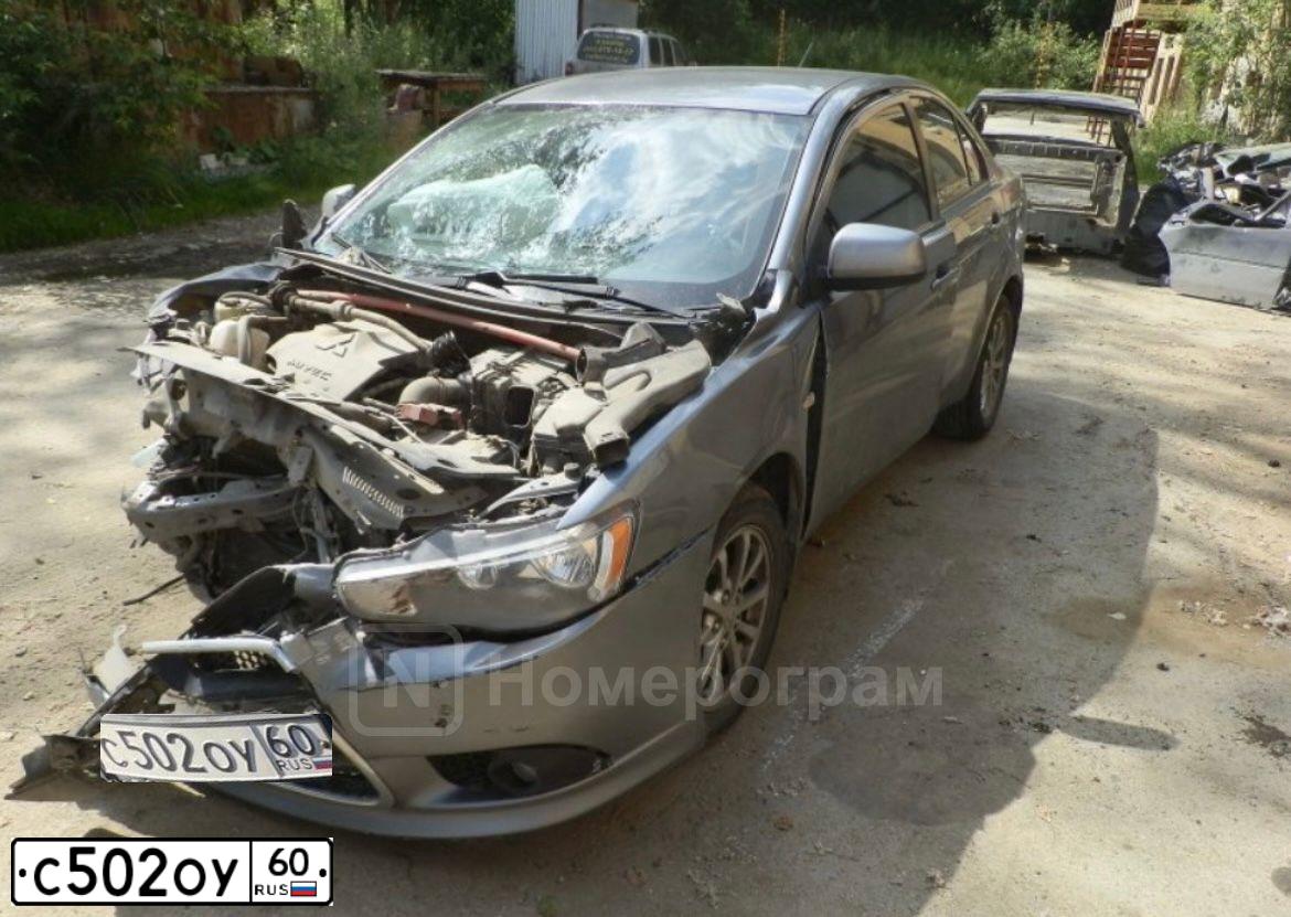 Фото автомобиля MITSUBISHI LANCER, 2008 — госномер С502ОУ60. Цвет: Серый