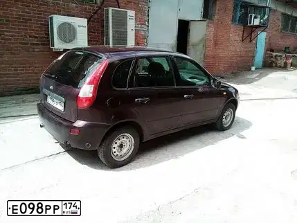 Фото автомобиля LADA 1119 KALINA, 2013 — госномер А204МО702. Цвет: ТЕМНО-ВИШНЕВЫЙ
