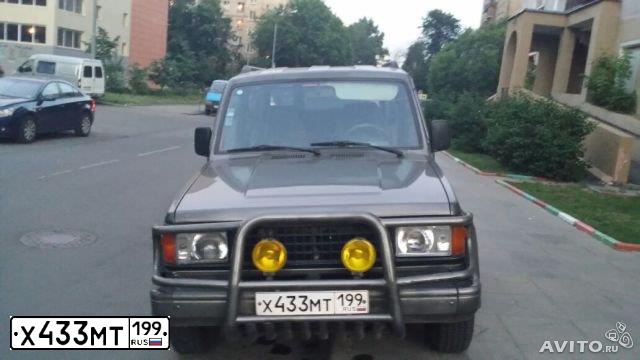 Фото автомобиля ISUZU TROOPER, 1992 — госномер Х433МТ199. Цвет: СЕРЫЙ