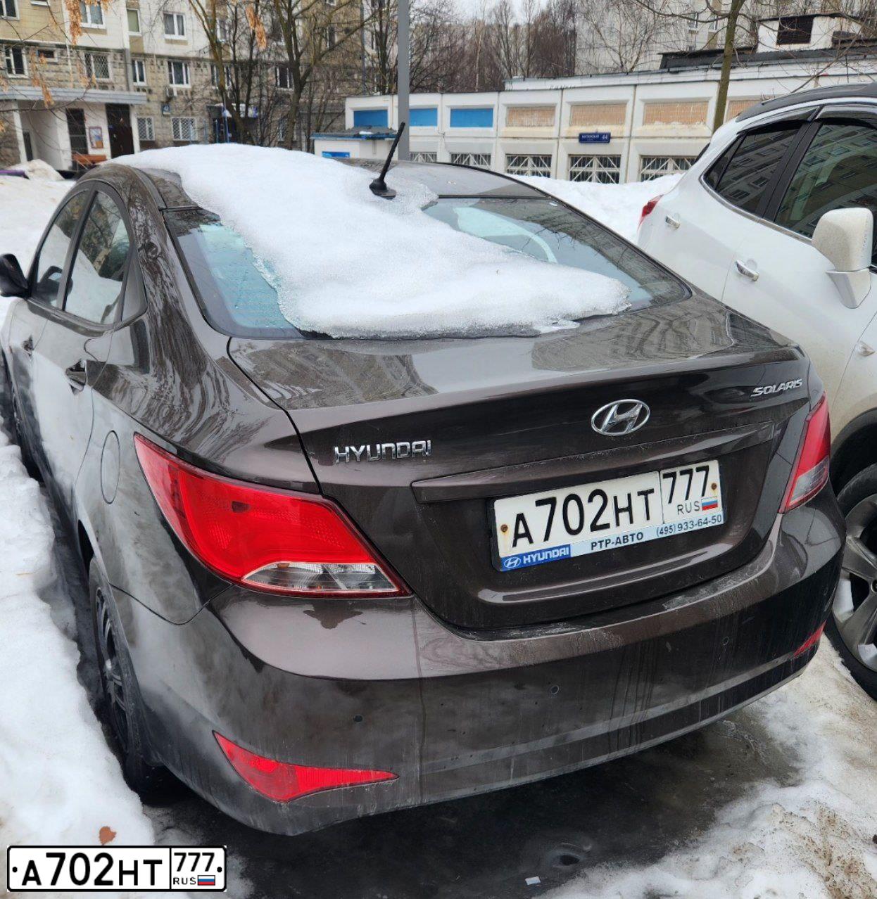 Фото автомобиля HYUNDAI SOLARIS, 2015 — госномер А702НТ777. Цвет: Коричневый