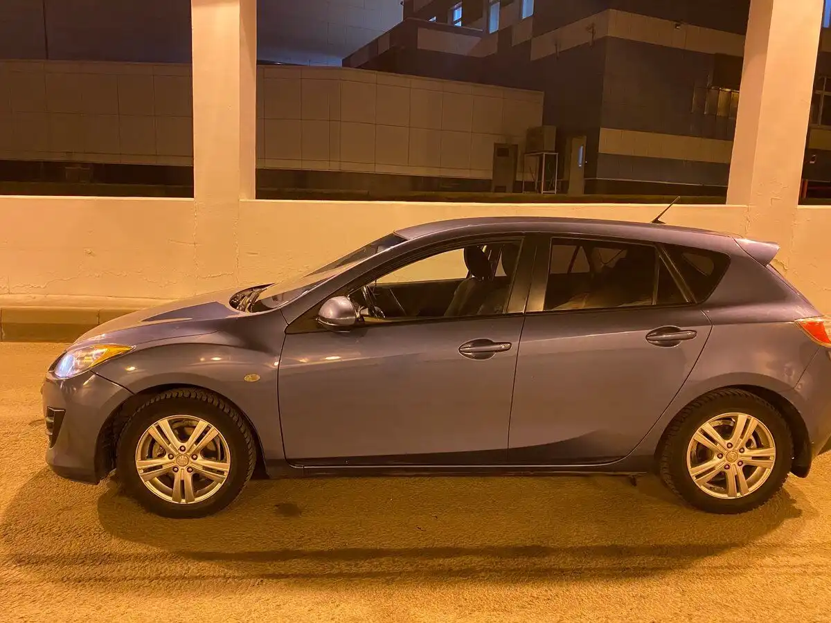 Фото автомобиля MAZDA A 3, 2010 — госномер Т509ЕН58. Цвет: СЕРО-ГОЛУБОЙ