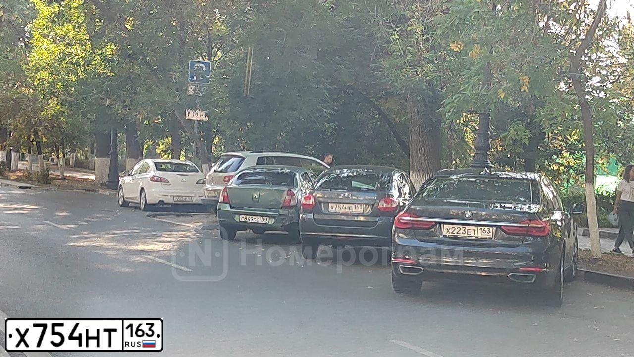 Фото автомобиля LADA 2110, 2002 — госномер Х754НТ163. Цвет: СИНИЙ