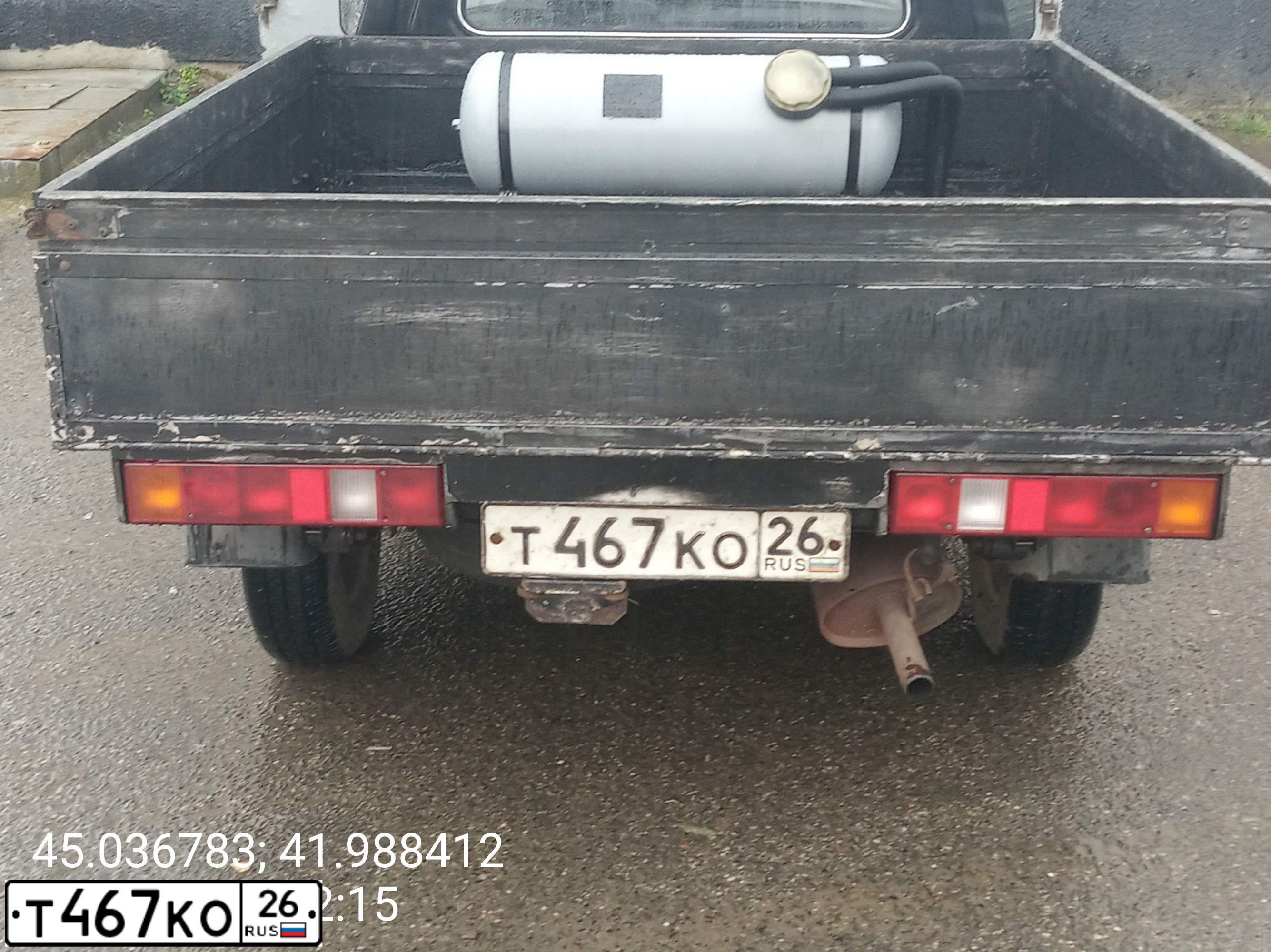 Фото автомобиля LADA 2345 WIS, 2006 — госномер Т467КО26. Цвет: ЧЕРНЫЙ