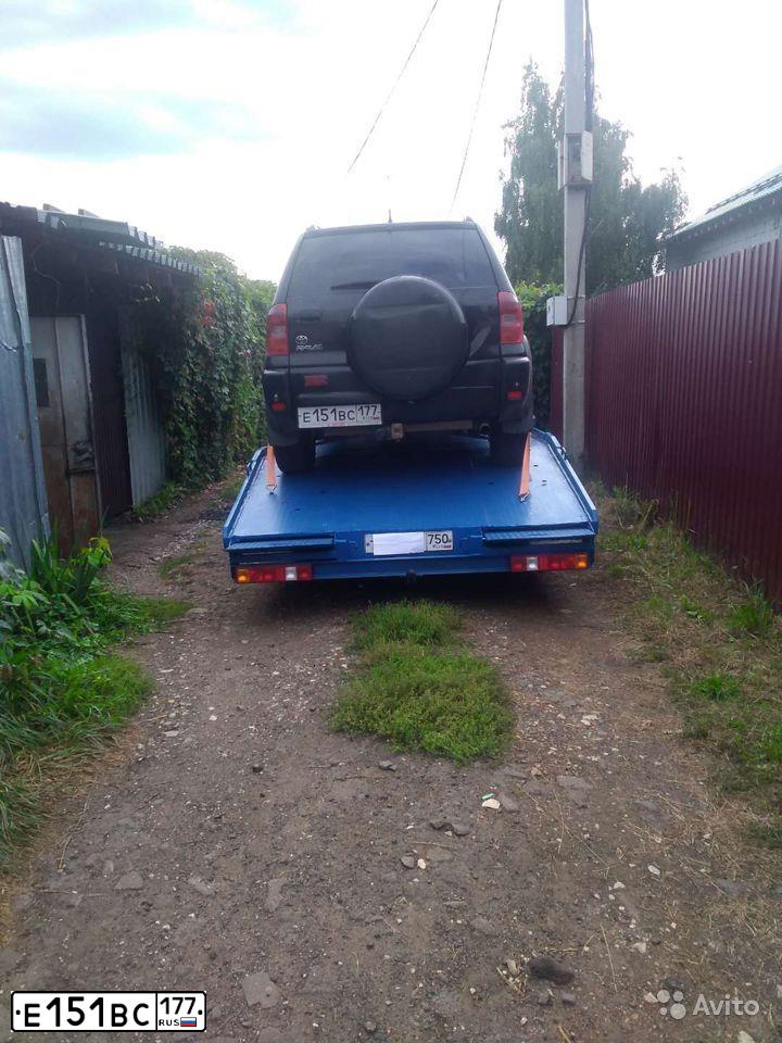 Фото автомобиля TOYOTA RAV4, 2002 — госномер Е151ВС177. Цвет: ЧЕРНЫЙ