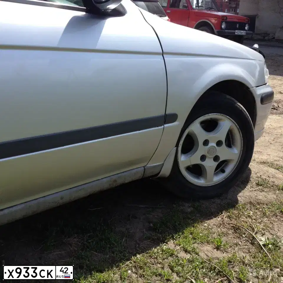 Фото автомобиля NISSAN SUNNY, 2001 — госномер Н200ЕУ70
