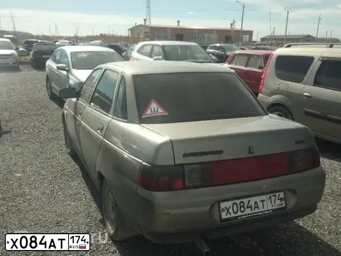 Фото автомобиля LADA 2110, 2001 — госномер Х084АТ174. Цвет: СЕРО-ЗЕЛЕНЫЙ