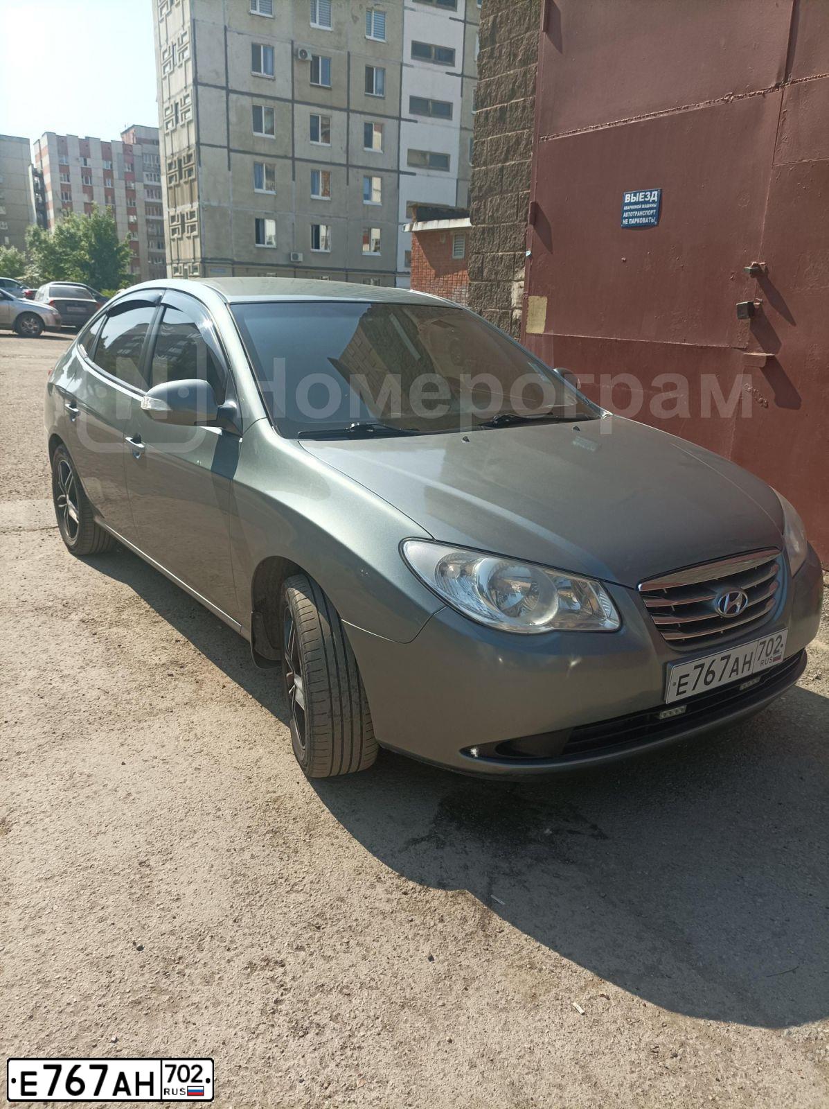 Фото автомобиля HYUNDAI ELANTRA, 2010 — госномер Е767АН702. Цвет: Серый