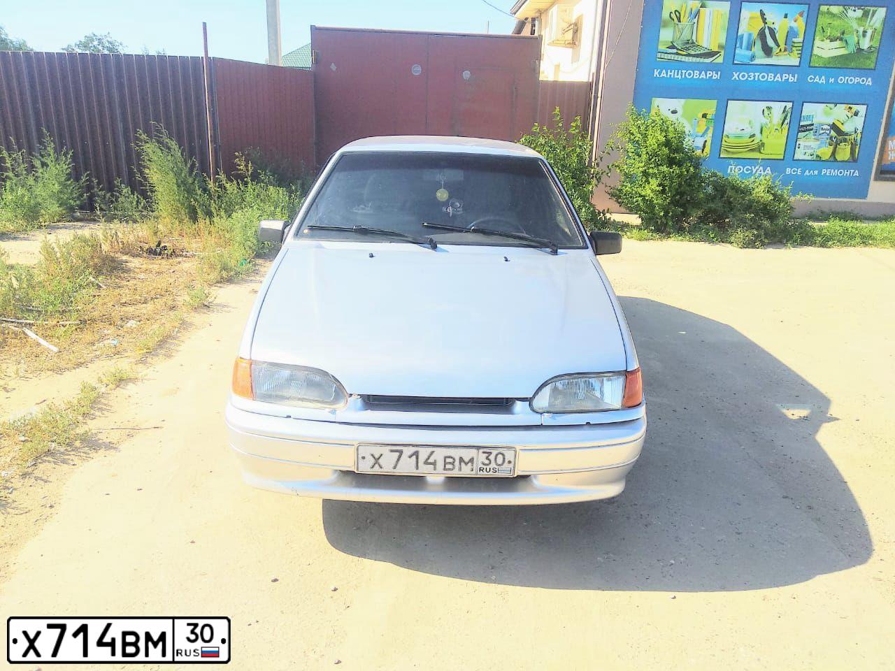 Фото автомобиля LADA 2114 SAMARA, 2004 — госномер Х714ВМ30. Цвет: Светло-Серебристый металлик