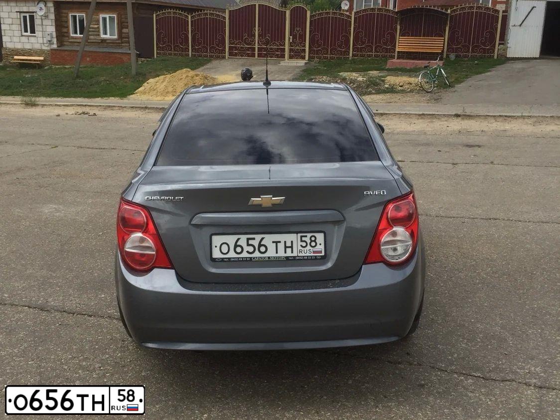 Фото автомобиля CHEVROLET AVEO, 2013 — госномер О656ТН58. Цвет: БЕЛЫЙ
