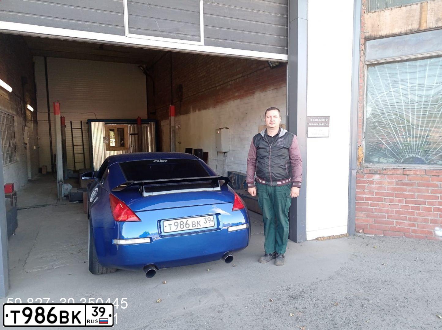 Фото автомобиля NISSAN 350 Z, 2004 — госномер О200АК198. Цвет: синий