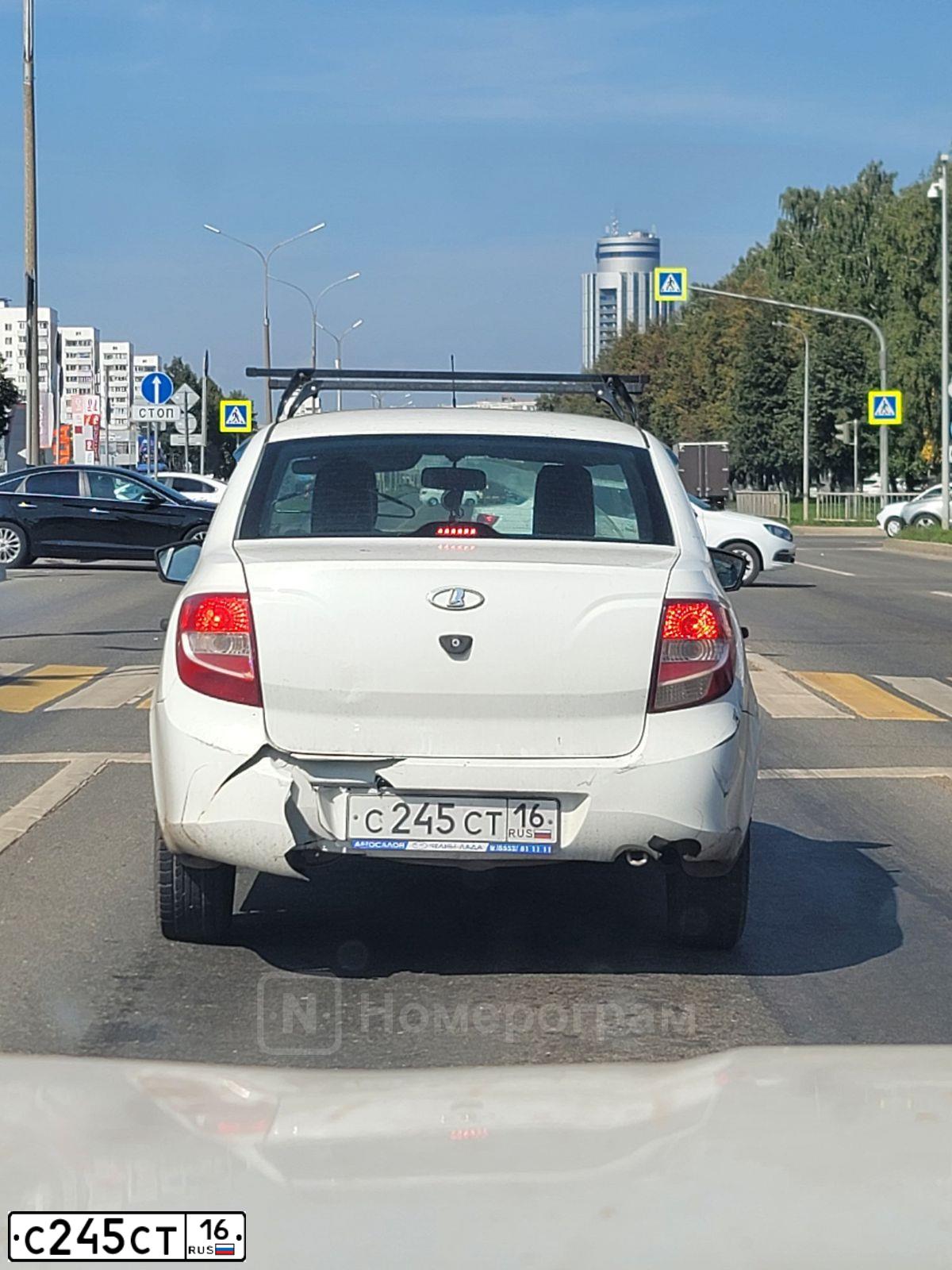 Фото автомобиля LADA 2190 GRANTA, 2015 — госномер С245СТ16. Цвет: БЕЛЫЙ