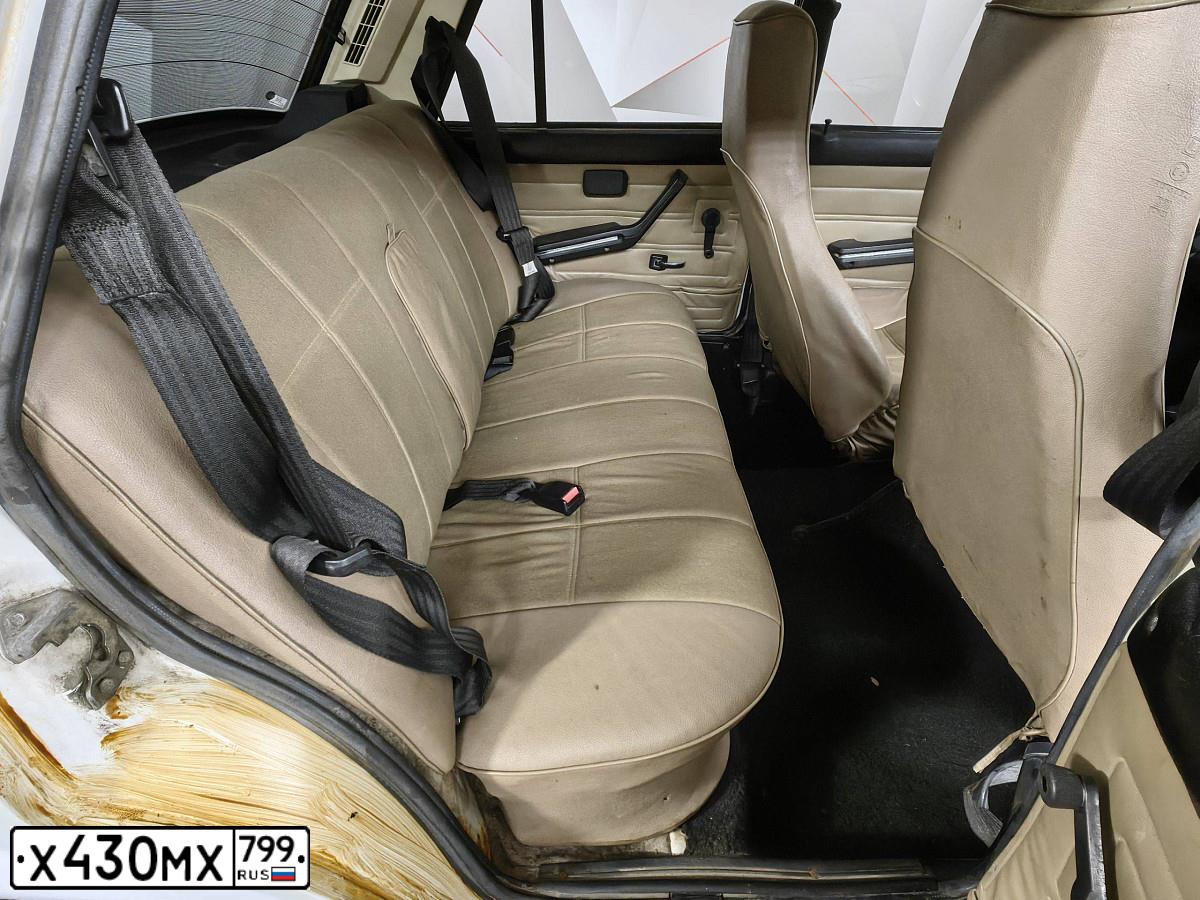 Фото автомобиля LADA 2107, 1991 — госномер Х430МХ799. Цвет: Белый