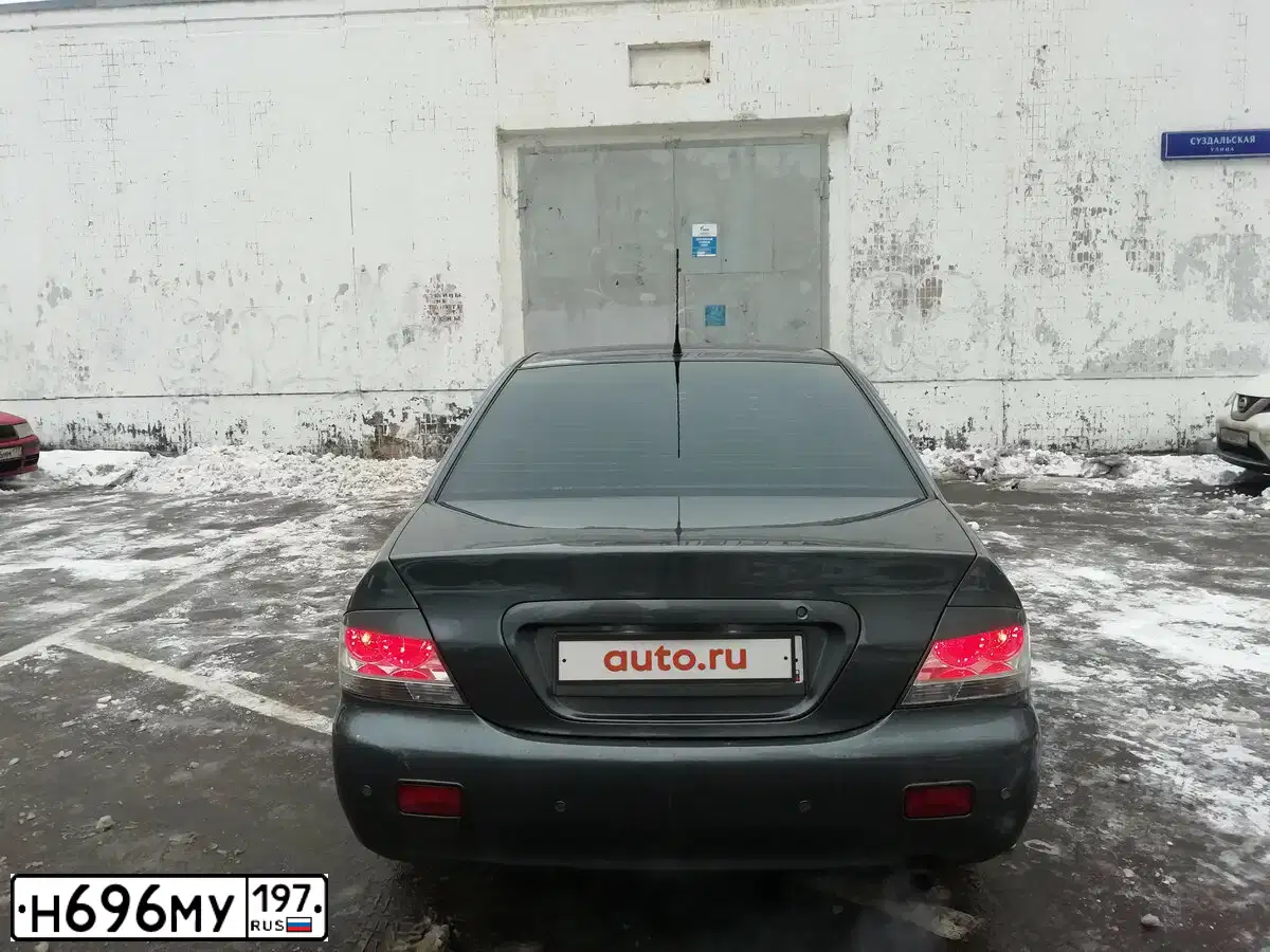 Фото автомобиля MITSUBISHI LANCER, 2005 — госномер О155ОА46. Цвет: Серый