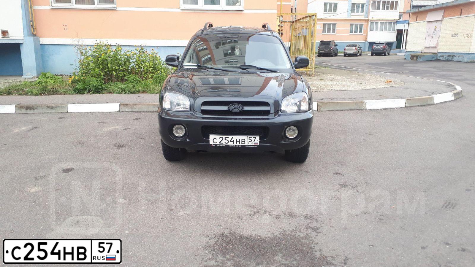 Фото автомобиля TAGAZ SANTA FE CLASSIC, 2012 — госномер С832ЕО750. Цвет: ЧЕРНЫЙ
