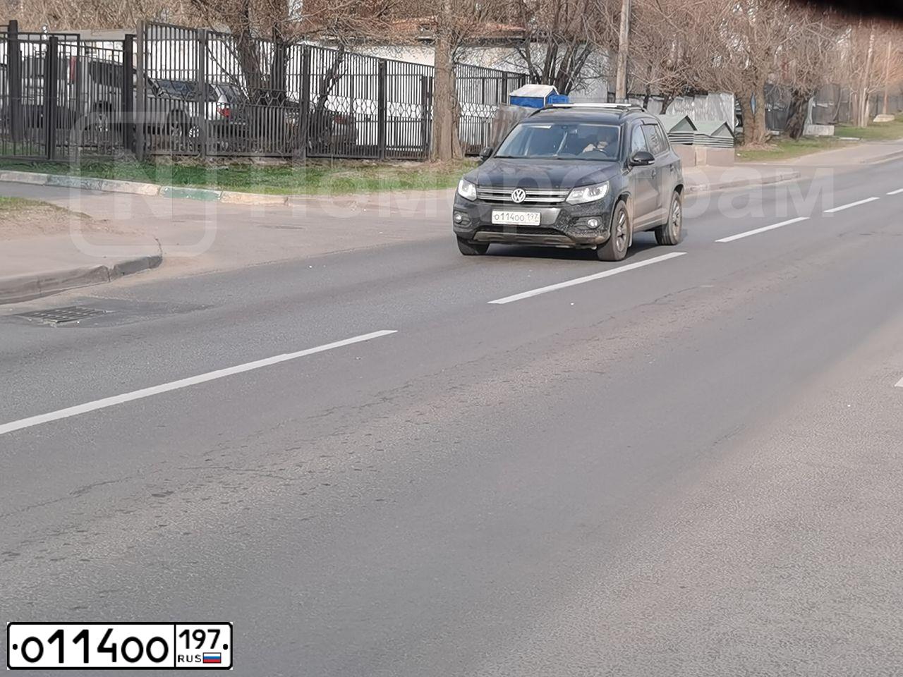 Фото автомобиля VOLKSWAGEN TIGUAN, 2012 — госномер О114ОО197. Цвет: ЧЕРНЫЙ
