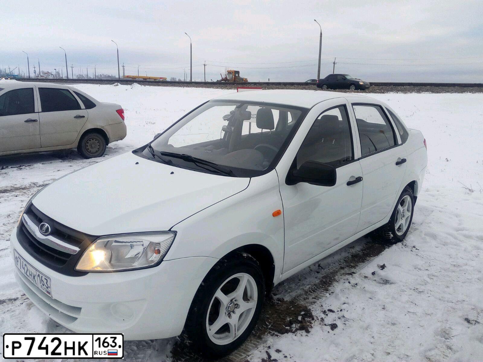 Фото автомобиля LADA 2190 GRANTA, 2012 — госномер С811ХВ73. Цвет: Белый