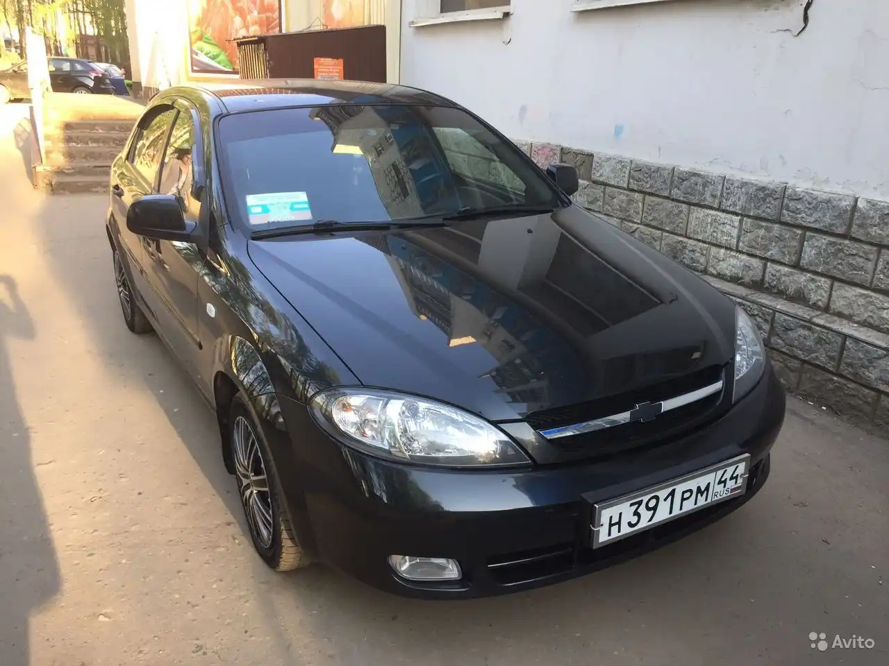 Фото автомобиля CHEVROLET LACETTI, 2011 — госномер В987УУ37. Цвет: ЧЕРНЫЙ