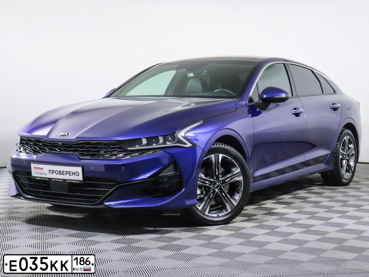 Фото автомобиля KIA K5, 2021 — госномер Н224ОО799. Цвет: синий