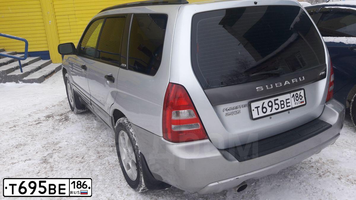 Фото автомобиля SUBARU FORESTER, 2004 — госномер Р774СН154. Цвет: Серебристый