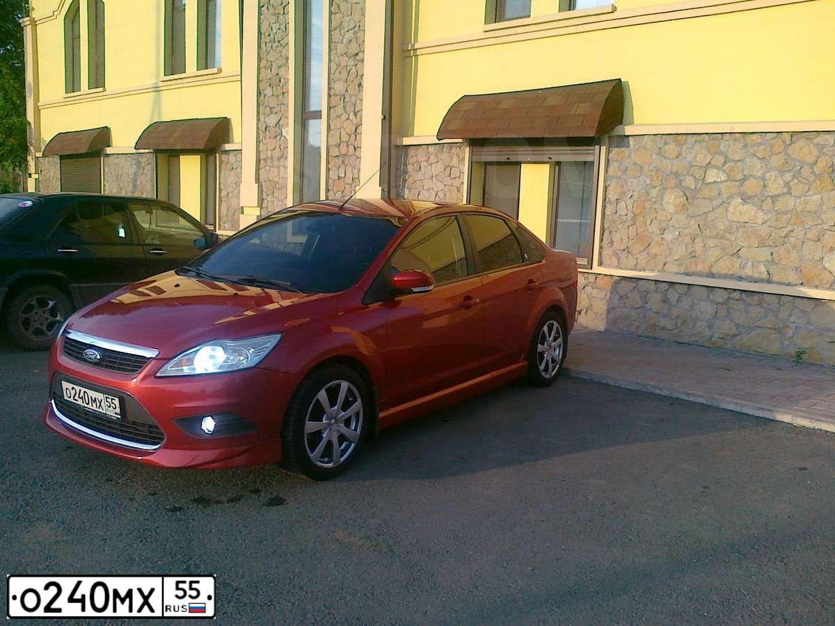 Фото автомобиля FORD FOCUS, 2008 — госномер О828АС55. Цвет: Красный