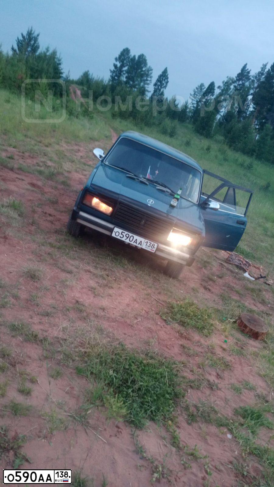 Фото автомобиля LADA 2105, 2004 — госномер О590АА138. Цвет: СИНЕ-ЗЕЛЕНЫЙ