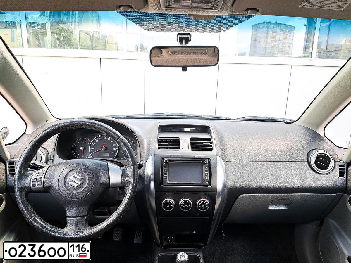 Фото автомобиля SUZUKI SX 4, 2008 — госномер М341ХО702. Цвет: Красный