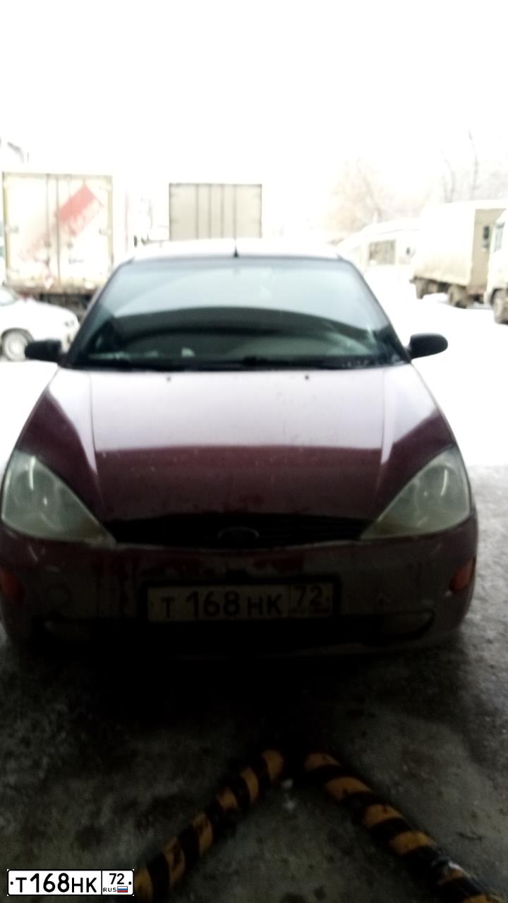 Фото автомобиля FORD FOCUS, 2002 — госномер Р854МН196. Цвет: Красный