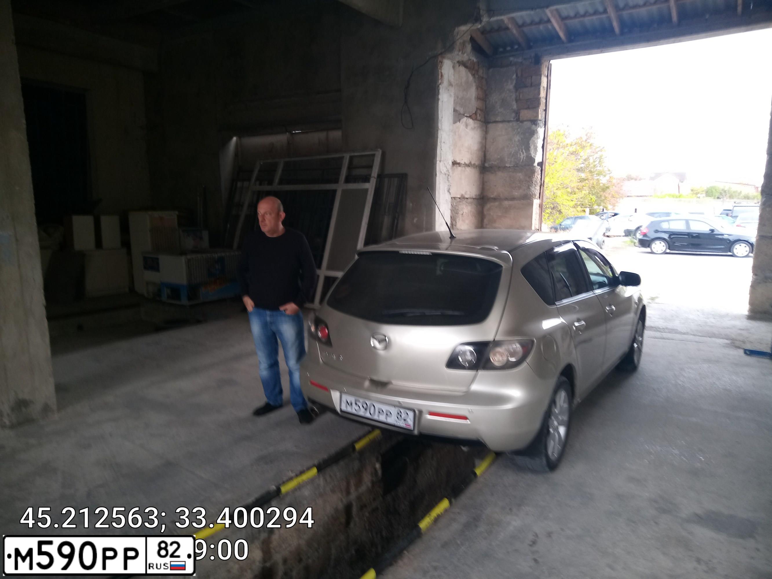 Фото автомобиля MAZDA A 3, 2007 — госномер М684УМ82. Цвет: СЕРО-ЗОЛОТИСТЫЙ