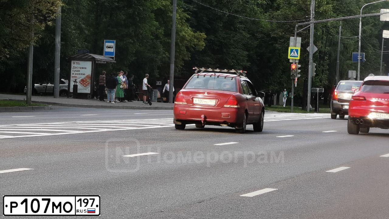 Фото автомобиля MITSUBISHI LANCER, 2006 — госномер О388КН71. Цвет: КРАСНЫЙ