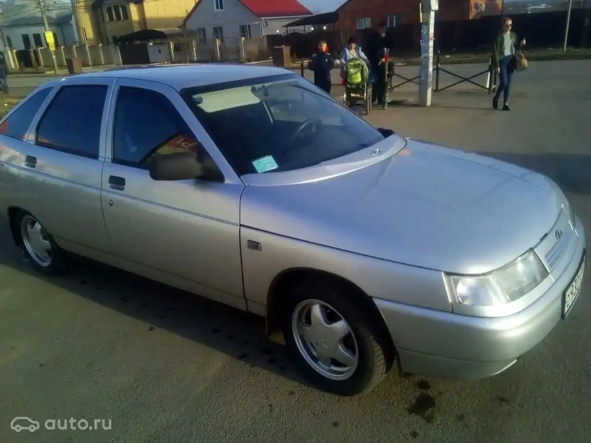 Фото автомобиля LADA 2112, 2007 — госномер О930УР26. Цвет: СВЕТЛО-СЕРЕБРИСТЫЙ  МЕТАЛЛИК