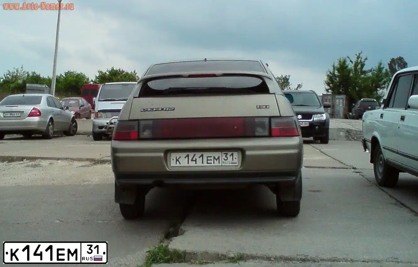 Фото автомобиля LADA 2112, 2003 — госномер К141ЕМ31. Цвет: СЕРЕБРИСТО-СЕРО-ЗЕЛЕНЫЙ