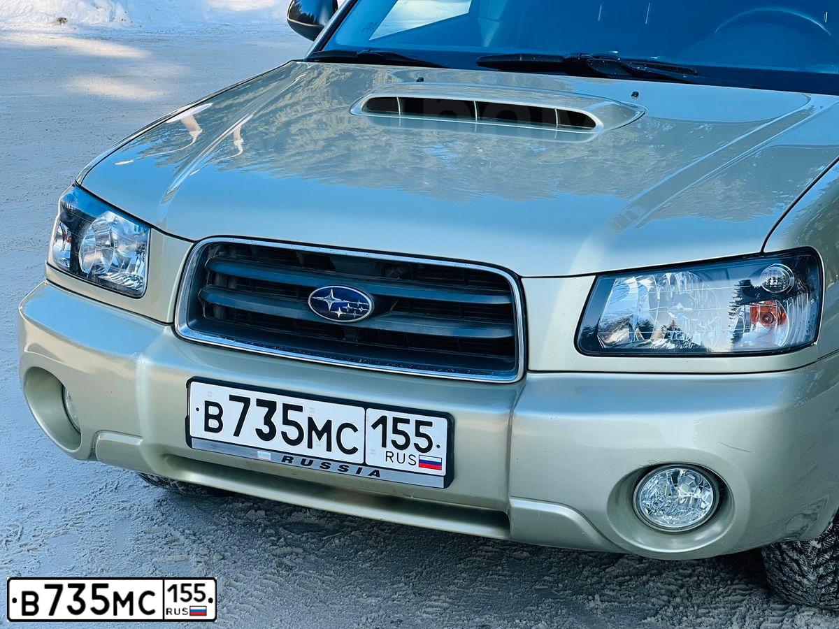 Фото автомобиля SUBARU FORESTER, 2003 — госномер В735МС155. Цвет: ЗОЛОТИСТЫЙ