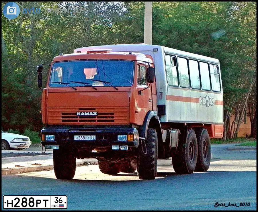 Фото автомобиля KAMAZ 4311, 2009 — госномер Н792УК27. Цвет: Оранжевый
