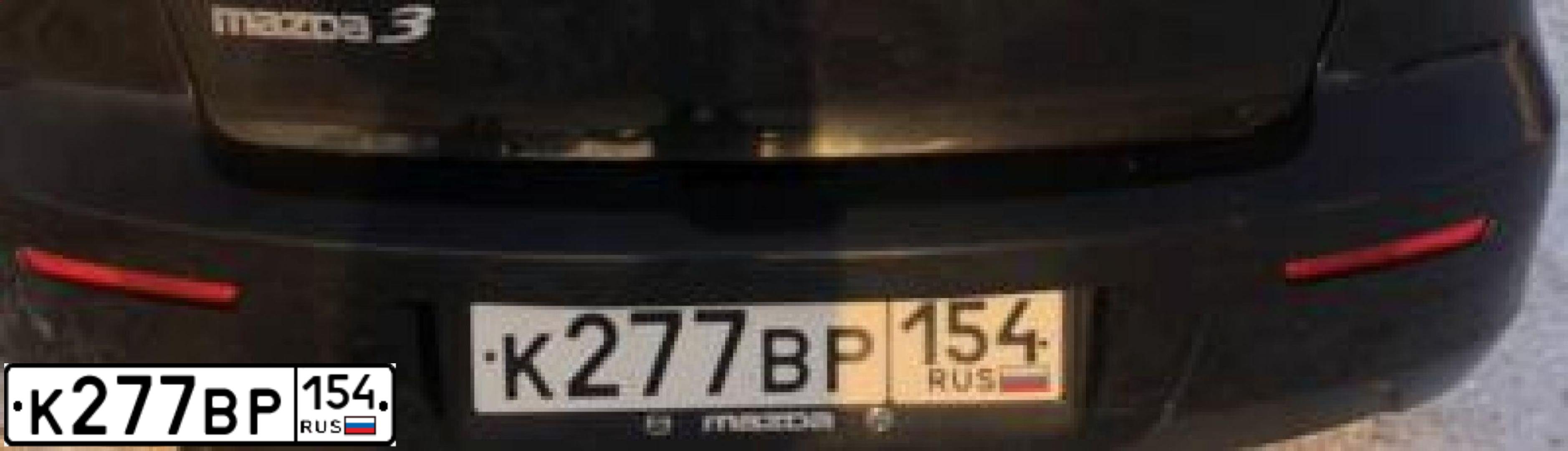 Фото автомобиля MAZDA 3, 2007 — госномер М055ТХ54. Цвет: ЧЕРНЫЙ