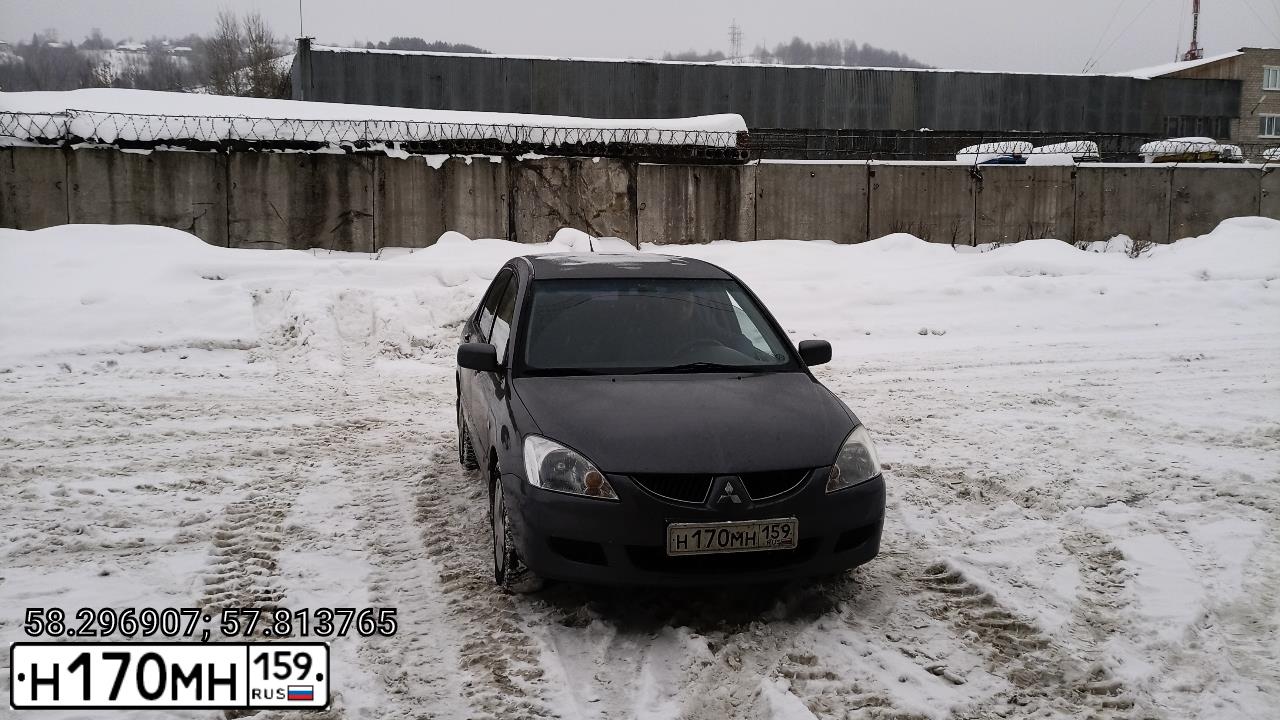 Фото автомобиля MITSUBISHI LANCER, 2005 — госномер У655АЕ59. Цвет: Серый