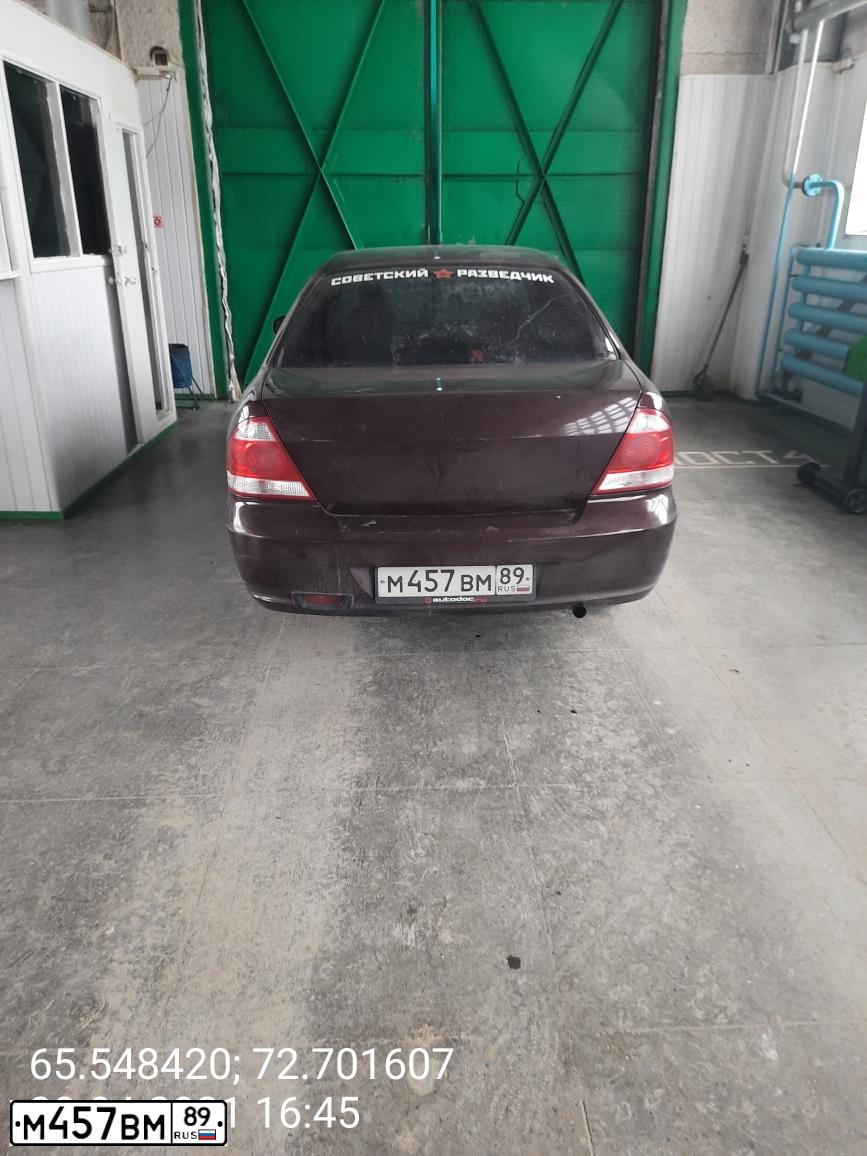 Фото автомобиля NISSAN ALMERA, 2007 — госномер М457ВМ89. Цвет: Красный