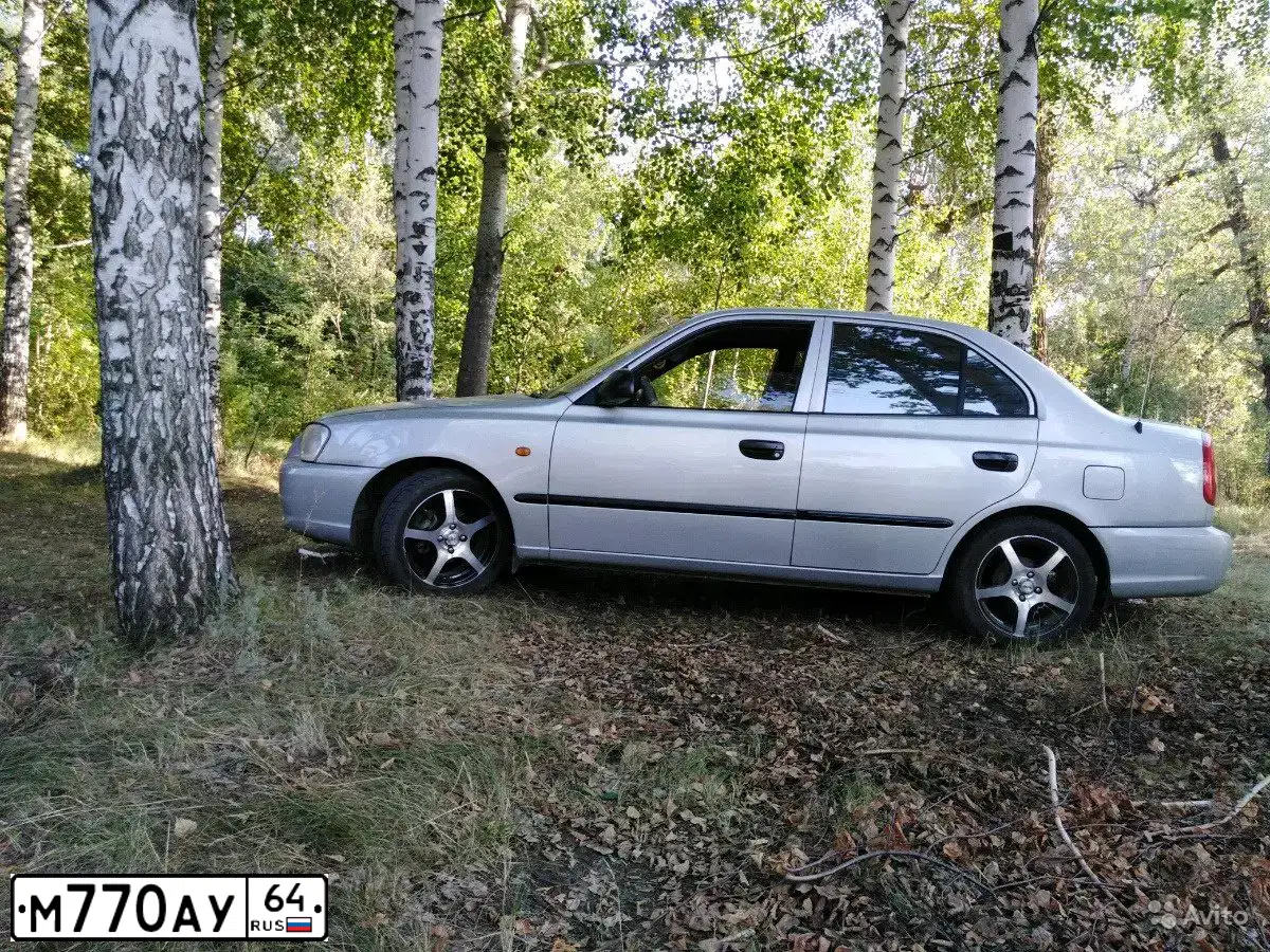 Фото автомобиля LADA 2114 SAMARA, 2004 — госномер М770АУ64. Цвет: СРЕДНИЙ СЕРО-ЗЕЛЕНЫЙ МЕТ