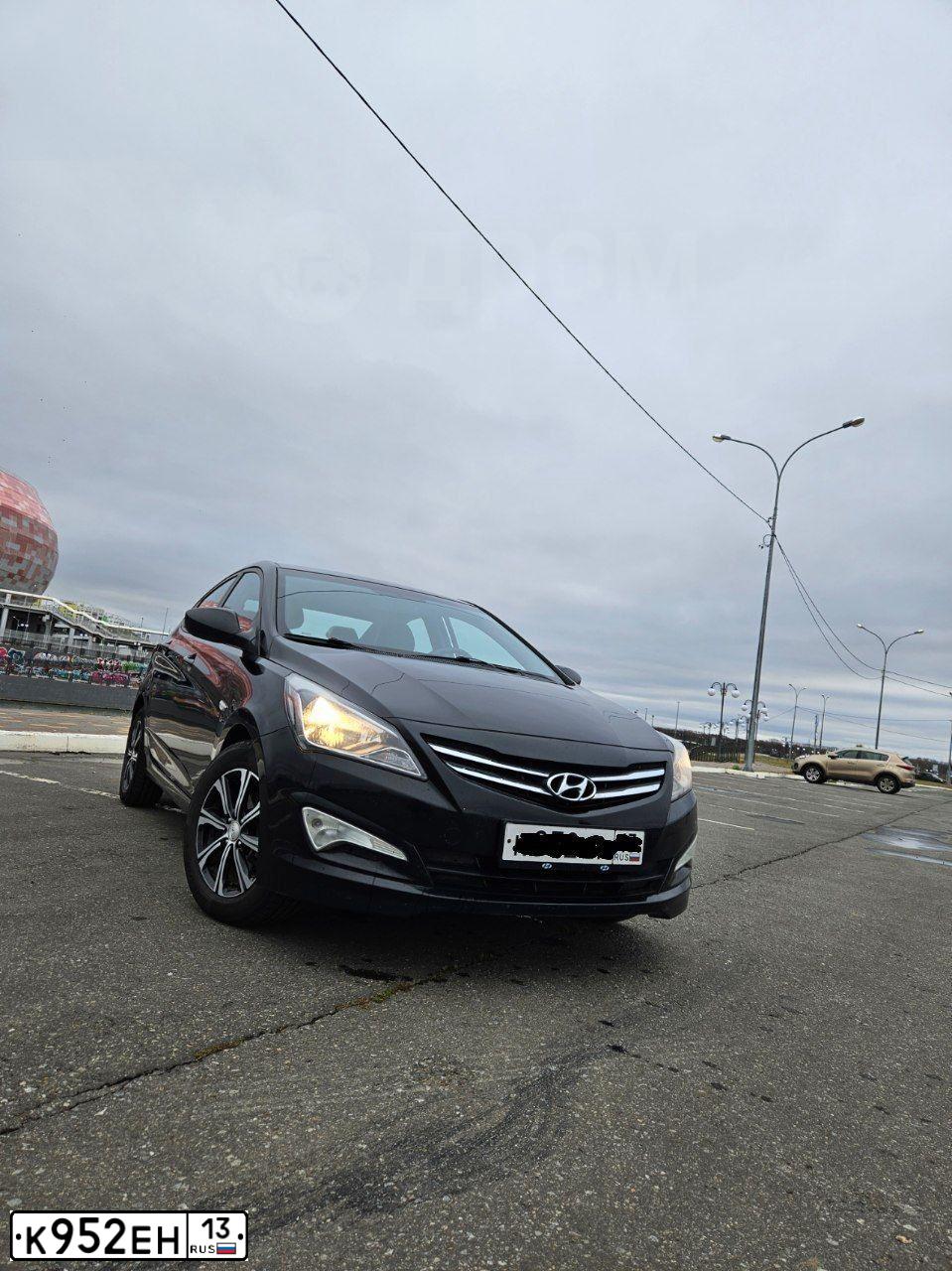 Фото автомобиля HYUNDAI SOLARIS, 2014 — госномер У203РВ152. Цвет: ЧЕРНЫЙ