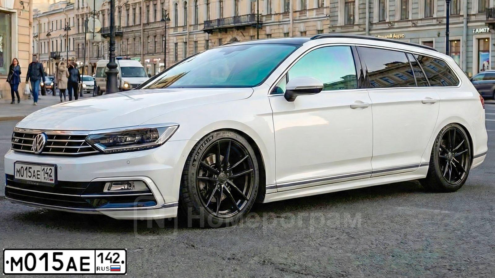 Фото автомобиля LADA 1117 KALINA, 2011 — госномер М015АЕ142. Цвет: Сине-Черный