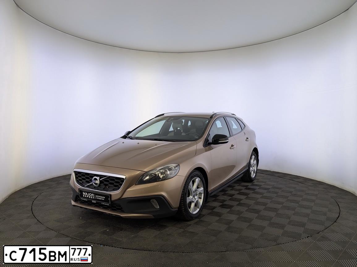 Фото автомобиля VOLVO V40, 2014 — госномер В066ММ799. Цвет: Коричневый