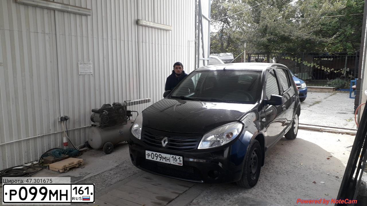 Фото автомобиля RENAULT SANDERO, 2011 — госномер Р099МН161. Цвет: ЧЕРНЫЙ