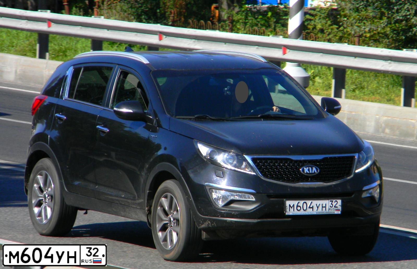 Фото автомобиля KIA SPORTAGE, 2014 — госномер М604УН32. Цвет: ЧЕРНЫЙ ПЕРЛАМУТР
