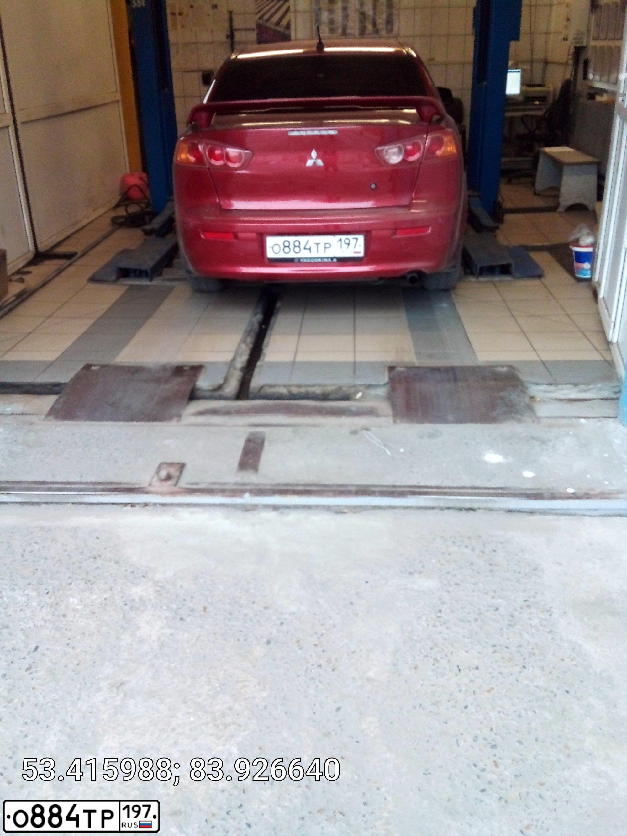 Фото автомобиля MITSUBISHI LANCER, 2008 — госномер В042ЕК122. Цвет: Красный