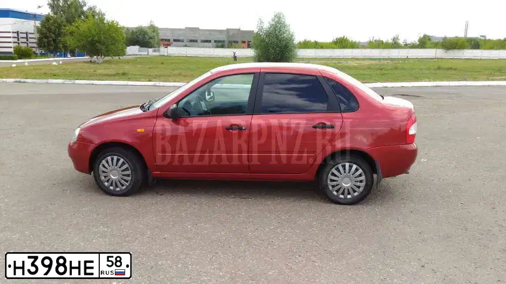 Фото автомобиля LADA 1118 KALINA, 2010 — госномер Н398НЕ58. Цвет: СЕРЕБРИСТО-КРАСНЫЙ
