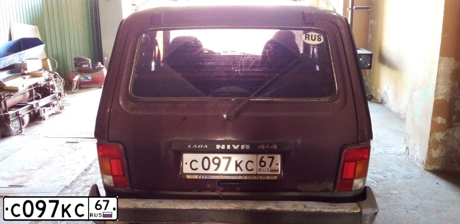 Фото автомобиля LADA 2121 NIVA, 2005 — госномер С097КС67. Цвет: ТЕМНО-ВИШНЕВЫЙ