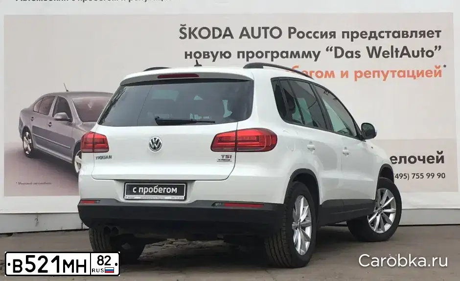Фото автомобиля VOLKSWAGEN TIGUAN, 2016 — госномер В521МН82. Цвет: Белый