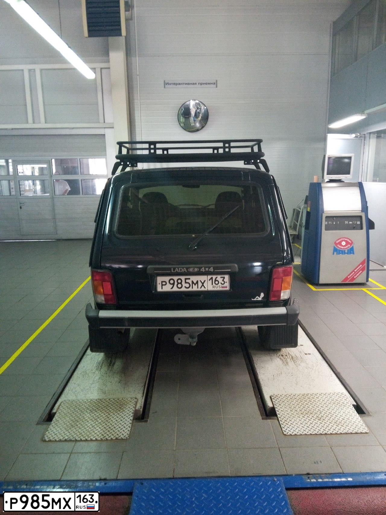 Фото автомобиля LADA 2121 NIVA, 2015 — госномер Р985МХ163. Цвет: ТЕМНО-ЗЕЛЕНЫЙ